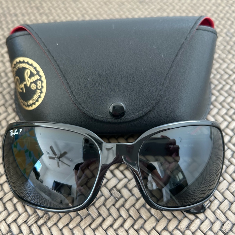 Women’s Ray Ban Polarized sunglasses.